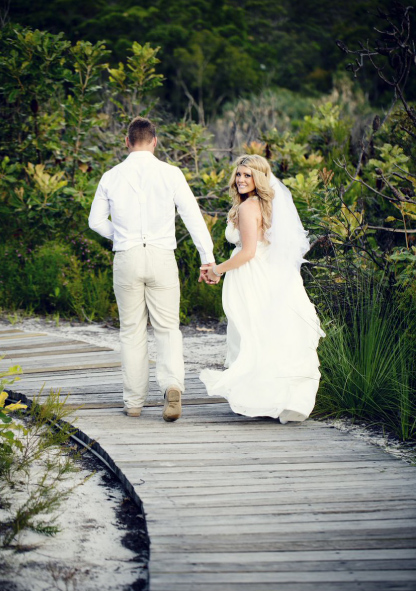 Beach wedding by Life and Love Photography